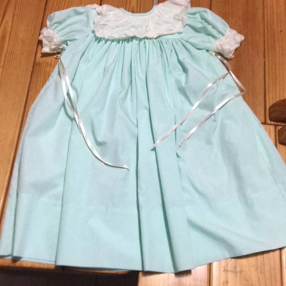 Mint baby dress with ribbons and cinched waist